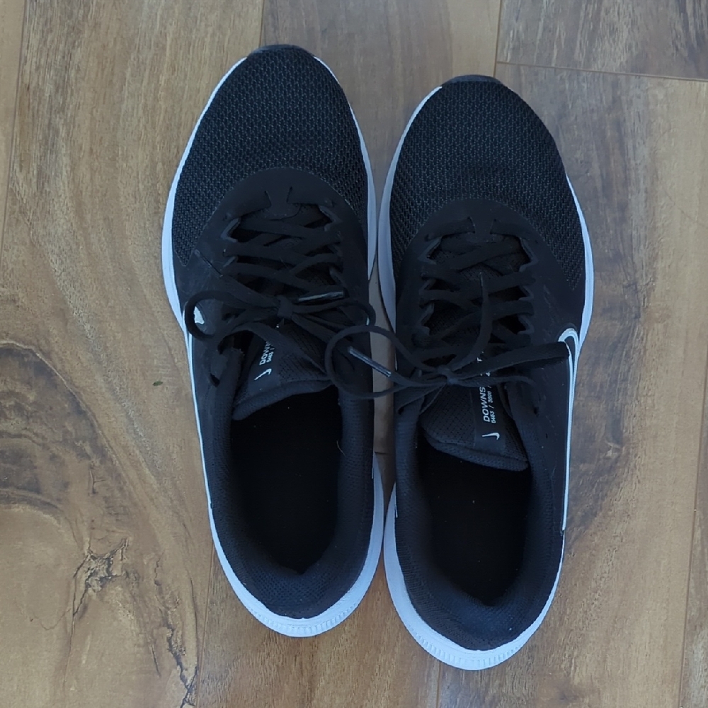 Barely Worn Women Nike Black and White Down shifter Athletic Running Shoes
